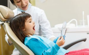 Central Dental Family - Dentist talking to a patient about emergency dentistry